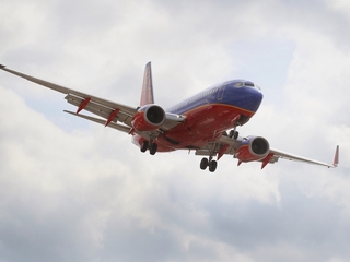 Passenger pokes flier with pen, gets kicked off